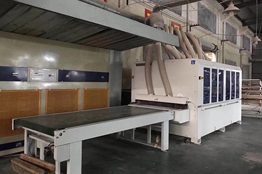 Sanding machine for solid wood door production line.
