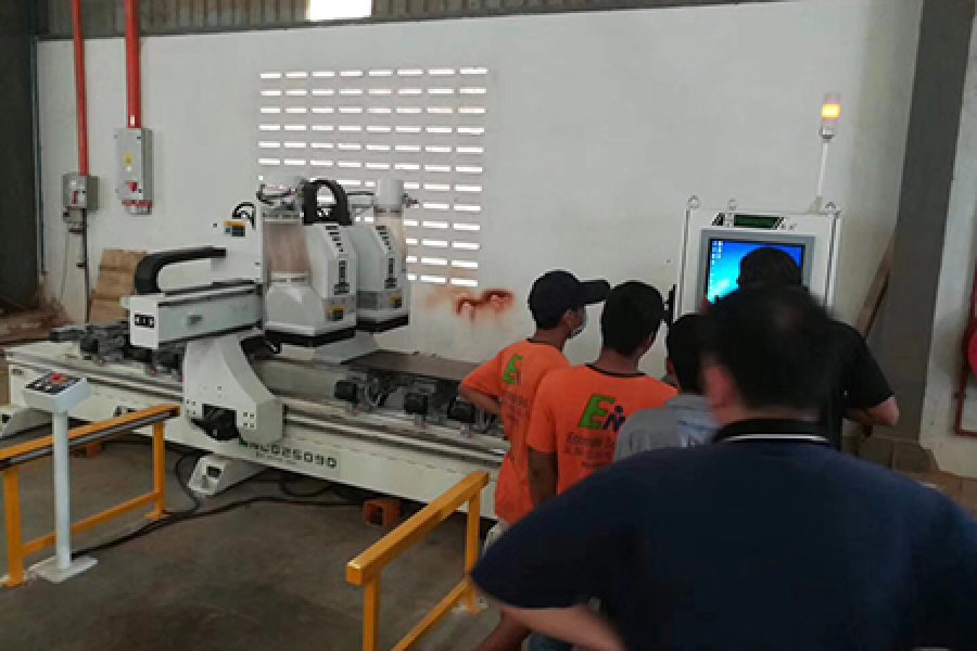 Congratulations the double bed CNC center drilling and engraving machine for Malaysia client just finished the commissioning and start the mass production.